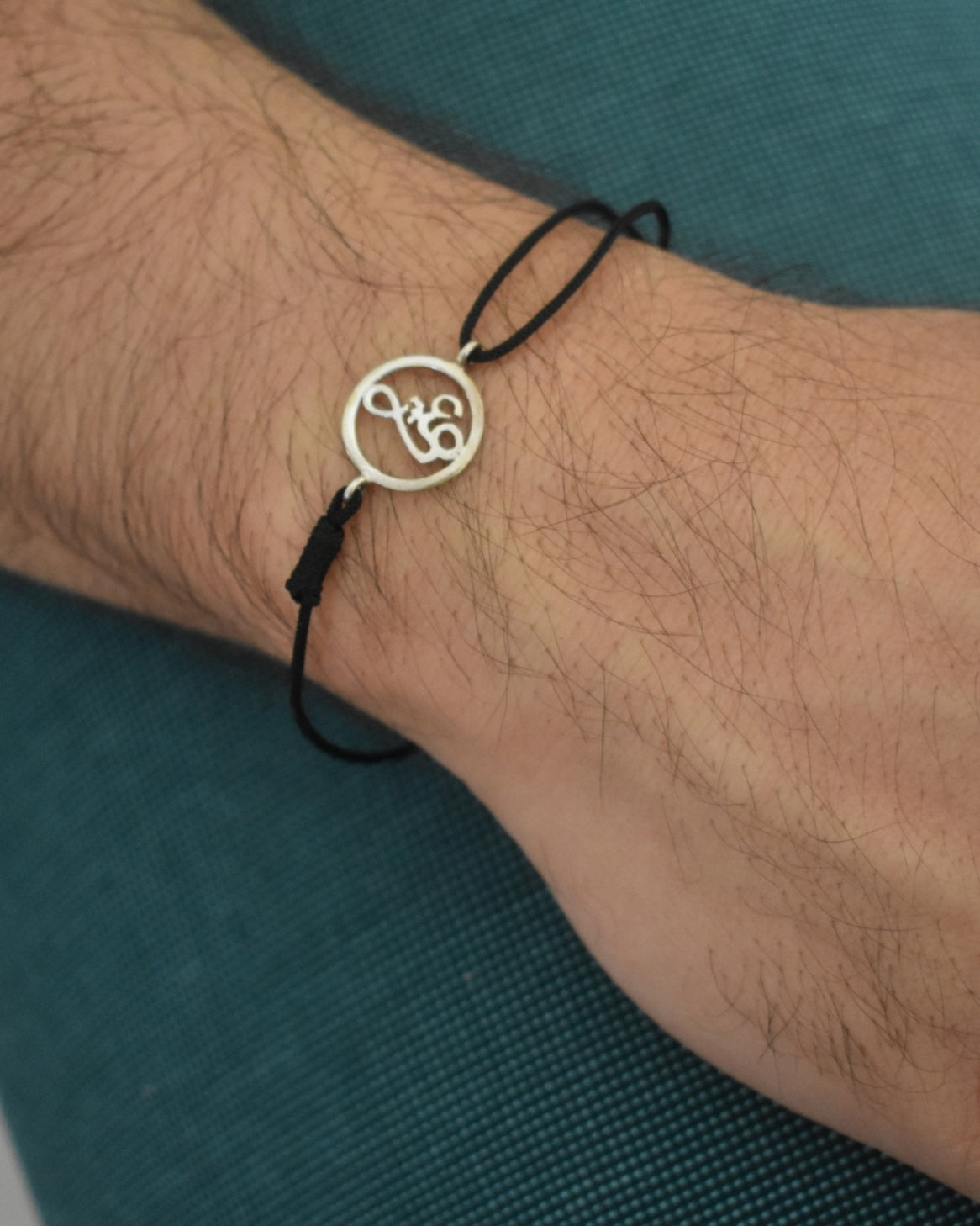 Bracelet: Silver Om with Adjustable Thread
