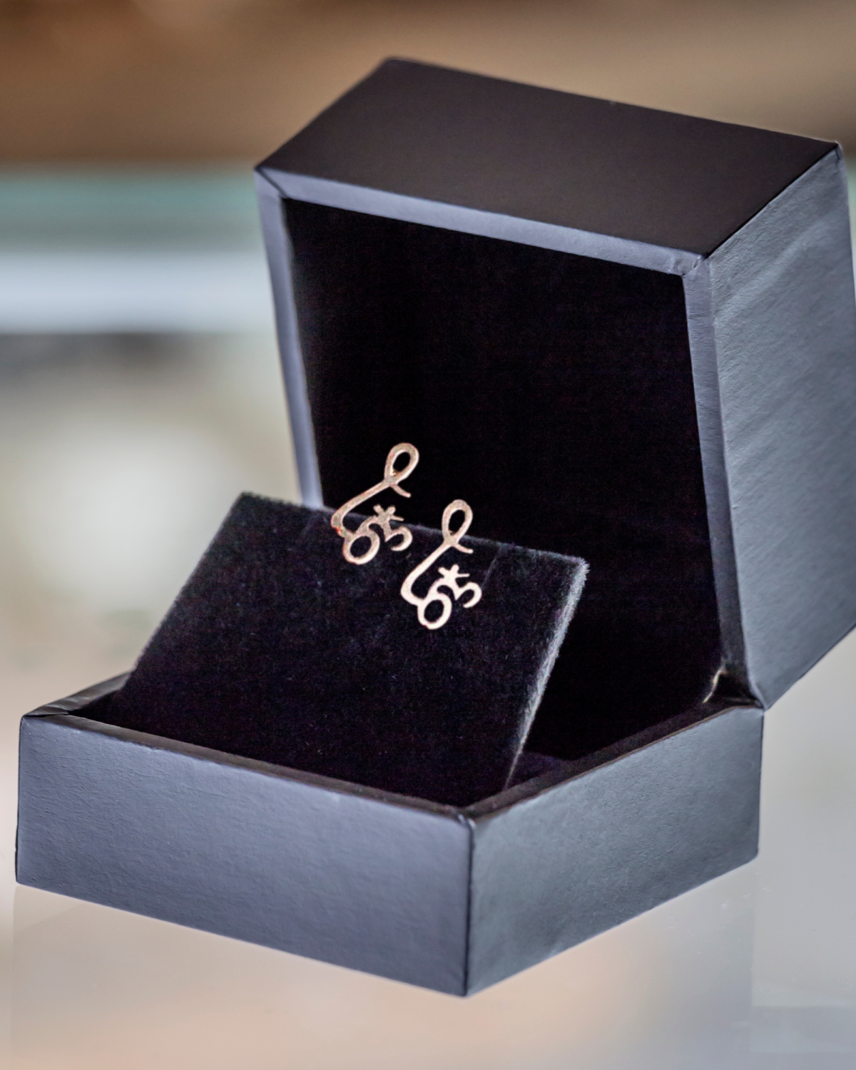 Silver: Sterling Om Stud Earrings